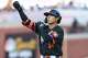Giants right fielder Jung Hoo Lee gestures to teammates Tuesday after hitting a single against the Washington Nationals at Oracle Park.