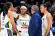 Dallas Wings guard Arike Ogunbowale (24) talks with guard Aziaha James (10), head coach Jose Fernandez and guard Azzi Fudd (35) during the first half of a WNBA basketball game against the Phoenix Mercury at College Park Center on Thursday, June 11, 2026, in Arlington, Texas.
