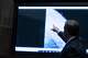 FILE - Deputy Director of Naval Intelligence Scott Bray points to a video display of a UAP during a hearing of the House Intelligence, Counterterrorism, Counterintelligence, and Counterproliferation Subcommittee hearing on "Unidentified Aerial Phenomena," on Capitol Hill, May 17, 2022, in Washington.