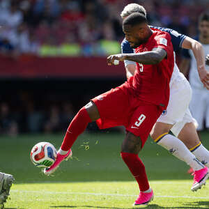 Super sub! Former UConn star Cyle Larin rescues Canada with 78th-minute equalizer in World Cup opener