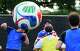 Fans play soccer with an oversized ball at the Dallas FIFA Fan Festival on Friday, June 12, 2026, in .