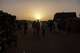 FILE - Night falls on the Adre, Chad, transit camp on May 6, 2025.
