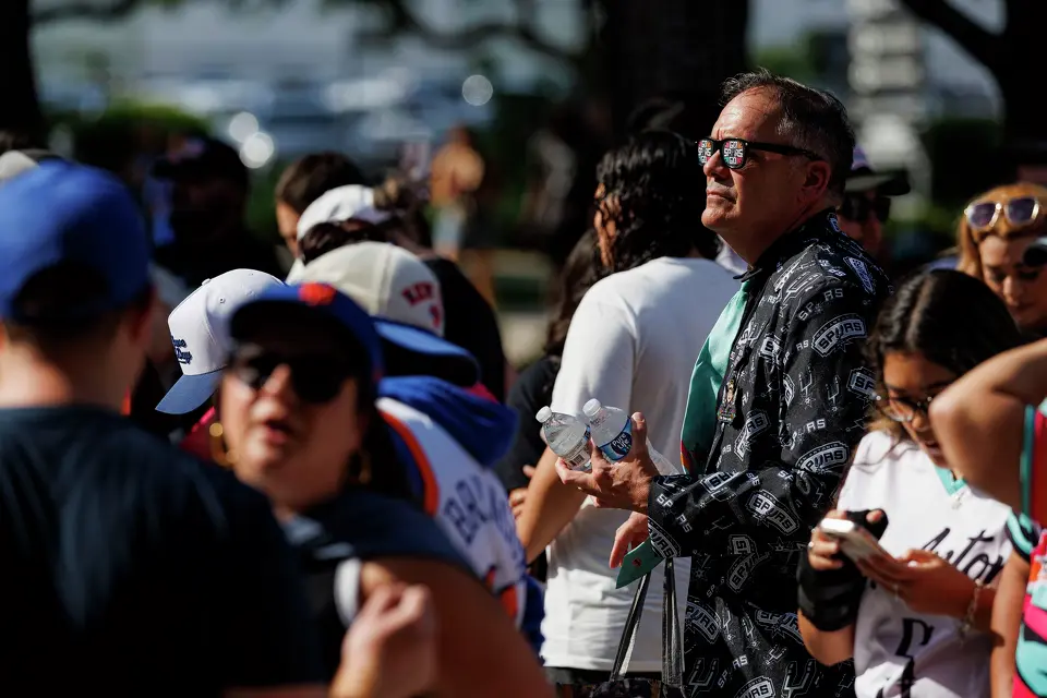 San Antonio Spurs fan Tony Nixon stands in line to get into Frost Bank Center in San Antonio, Saturday, June 13, 2026, before Game 5 of the NBA Finals between the New York Knicks and the San Antonio Spurs.