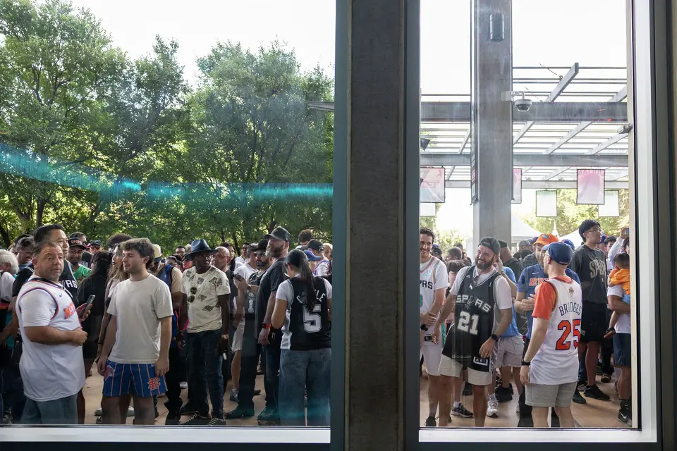 Fans wait for the doors to open prior to Game 5 of the NBA Finals at Frost Bank Center in San Antonio on Saturday, June 13, 2026.