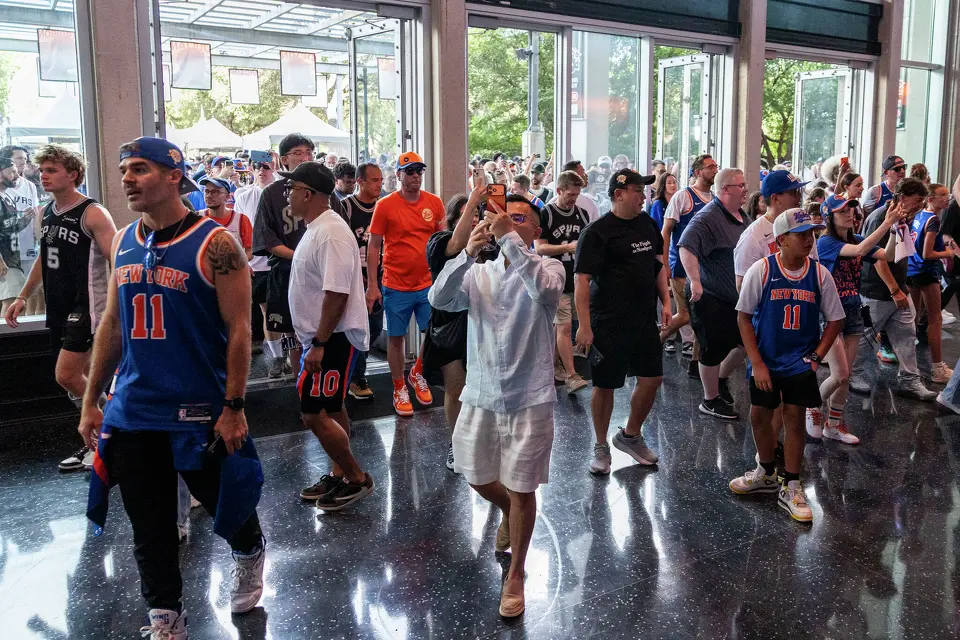 Fans wait for the doors to open prior to Game 5 of the NBA Finals at Frost Bank Center in San Antonio on Saturday, June 13, 2026.