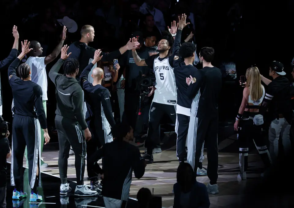 San Antonio Spurs guard Stephon Castle (5) high fives his teammates prior to the start of game five of the NBA Championship at Frost Bank Center on Saturday, June13, 2026.