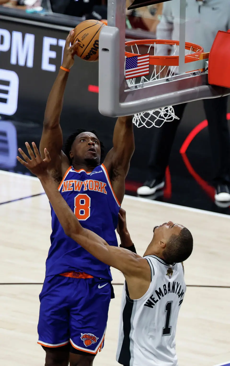 San Antonio Spurs forward Kelly Olynyk (8) gets a dunk over San Antonio Spurs center Victor Wembanyama (1) during the first quarter of game five of the NBA Championship at Frost Bank Center on Saturday, June13, 2026.