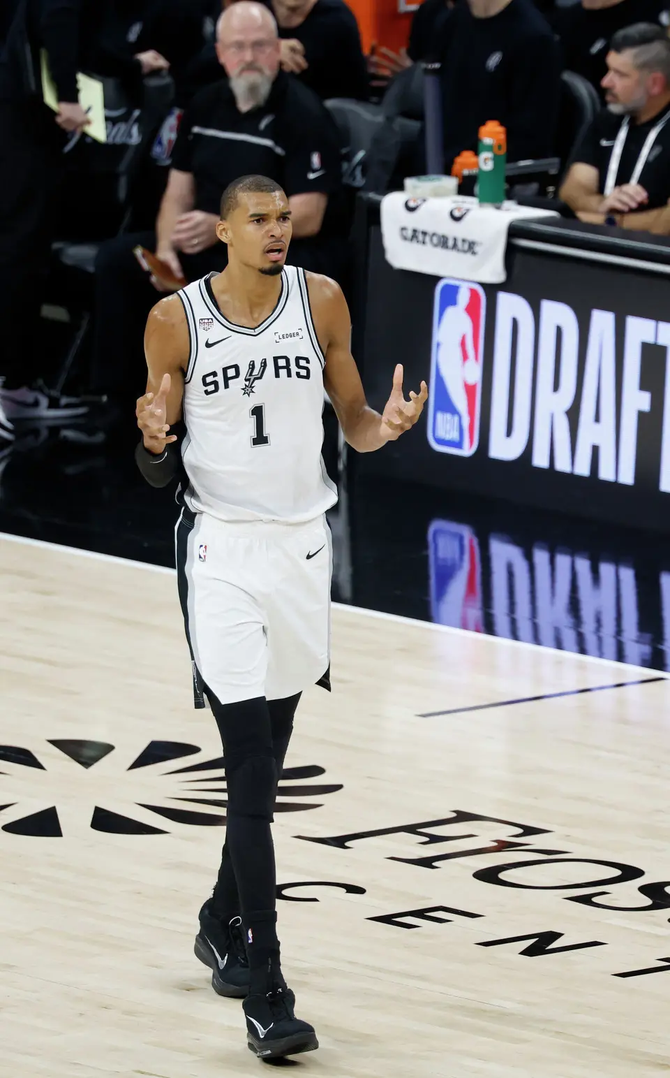 San Antonio Spurs center Victor Wembanyama (1) questions a foul early on in the first quarter of game five of the NBA Championship at Frost Bank Center on Saturday, June13, 2026.