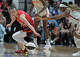 UNCASVILLE, CONNECTICUT - JUNE 13: Caitlin Clark #22 of the Indiana Fever and Aaliyah Edwards #8 of the Connecticut Sun scramble for the loose ball in the third quarter at Mohegan Sun Arena on June 13, 2026 in Uncasville, Connecticut. NOTE TO USER: User expressly acknowledges and agrees that, by downloading and or using this photograph, User is consenting to the terms and conditions of the Getty Images License Agreement. (Photo by Sean D. Elliot/Getty Images)