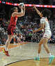 UNCASVILLE, CONNECTICUT - JUNE 13: Caitlin Clark #22 of the Indiana Fever launches a three pointer over Leila Lacan #47 of the Connecticut Sun in the first quarter at Mohegan Sun Arena on June 13, 2026 in Uncasville, Connecticut. NOTE TO USER: User expressly acknowledges and agrees that, by downloading and or using this photograph, User is consenting to the terms and conditions of the Getty Images License Agreement. (Photo by Sean D. Elliot/Getty Images)