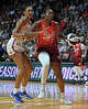 UNCASVILLE, CONNECTICUT - JUNE 13: Aliyah Boston #7 of the Indiana Fever drives by Olivia Nelson-Ododa #10 of the Connecticut Sun in the first quarter at Mohegan Sun Arena on June 13, 2026 in Uncasville, Connecticut. NOTE TO USER: User expressly acknowledges and agrees that, by downloading and or using this photograph, User is consenting to the terms and conditions of the Getty Images License Agreement. (Photo by Sean D. Elliot/Getty Images)