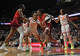 UNCASVILLE, CONNECTICUT - JUNE 13: Kelsey Mitchell #0 of the Indiana Fever drives along the baseline defended by Leila Lacan #47 of the Connecticut Sun in the second quarter at Mohegan Sun Arena on June 13, 2026 in Uncasville, Connecticut. NOTE TO USER: User expressly acknowledges and agrees that, by downloading and or using this photograph, User is consenting to the terms and conditions of the Getty Images License Agreement. (Photo by Sean D. Elliot/Getty Images)