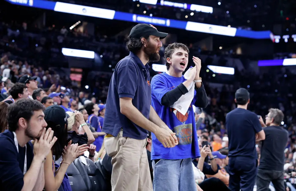 Timothée Chalamet right, and director Josh Safdie cheer in the Knicks during the second quarter of game five of the NBA Championship at Frost Bank Center on Saturday, June13, 2026.