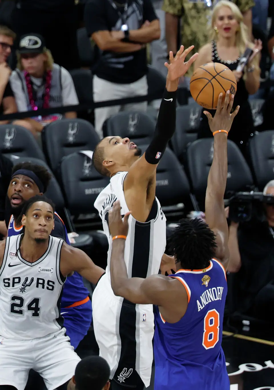 San Antonio Spurs center Victor Wembanyama (1) blocks a shot by New York Knicks forward Og Anunoby (8) during the third quarter of game five of the NBA Championship at Frost Bank Center on Saturday, June13, 2026.
