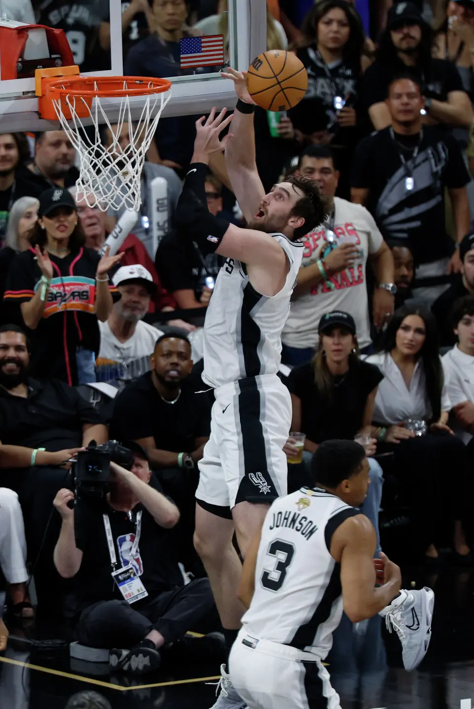 San Antonio Spurs center Luke Kornet (7) grabs a rebound during the third quarter of game five of the NBA Championship at Frost Bank Center on Saturday, June13, 2026.