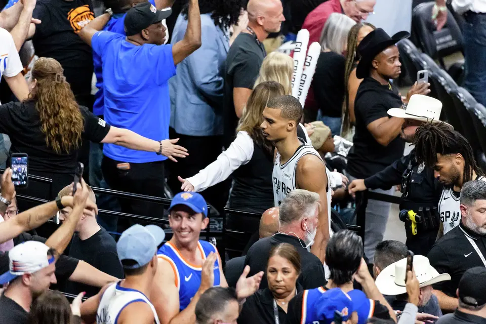 San Antonio Spurs center Victor Wembanyama walks off the court after the end of Game 5 of the NBA Finals at Frost Bank Center in San Antonio on Saturday, June 13, 2026. The New York Knicks defeated the Spurs 94-90.
