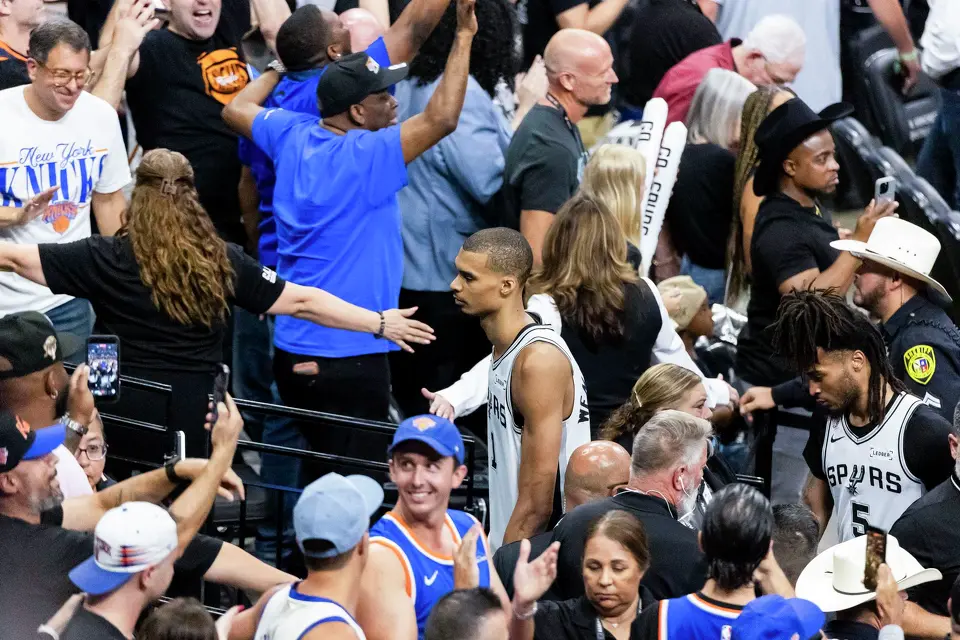 San Antonio Spurs center Victor Wembanyama walks off the court after the end of Game 5 of the NBA Finals at Frost Bank Center in San Antonio on Saturday, June 13, 2026. The New York Knicks defeated the Spurs 94-90.