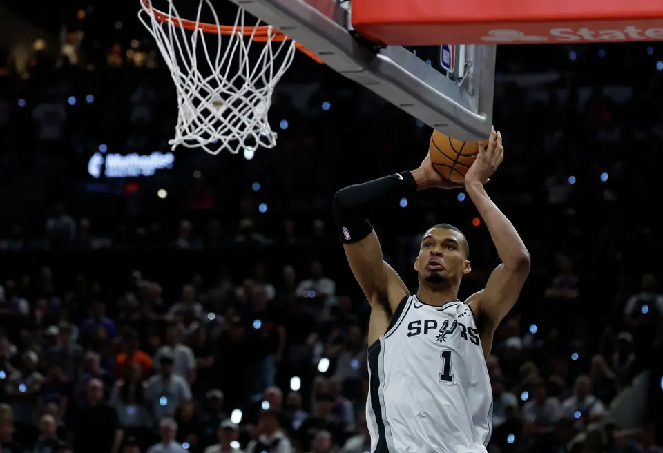 San Antonio Spurs center Victor Wembanyama (1) flies towards the basket for a dunk during the fourth quarter of game five of the NBA Championship at Frost Bank Center on Saturday, June13, 2026.