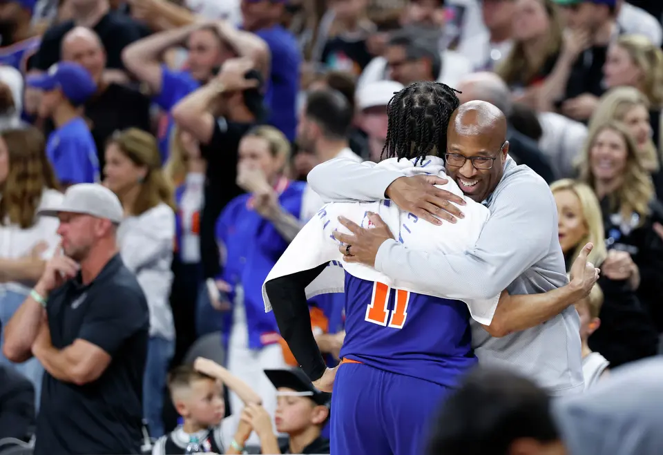 New York Knicks coach Mike Brown hugs guard Jalen Brunson after winning the NBA championship with a 94-90 win over the Spurs in Game 5 of the Finals at Frost Bank Center on Saturday, June 13, 2026. The Knicks won the final game 94-90.