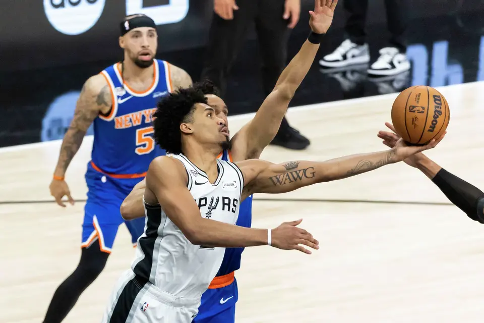 San Antonio Spurs guard Dylan Harper (2) reaches for the ball during Game 5 of the NBA Finals at Frost Bank Center in San Antonio on Saturday, June 13, 2026.
