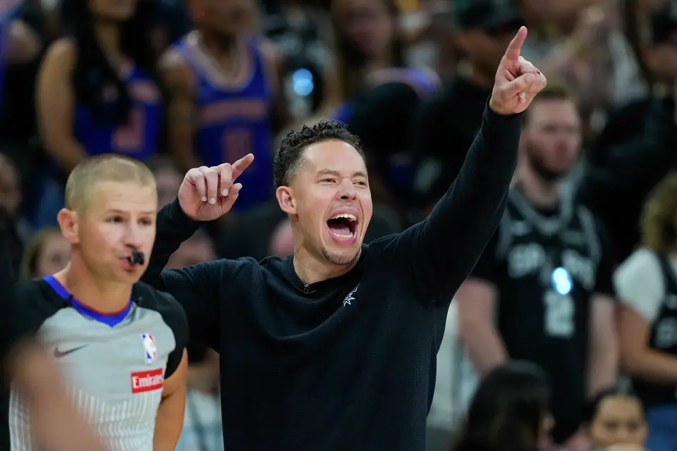 San Antonio Spurs head coach Mitch Johnson yells during the first half of Game 5 of the NBA Finals basketball series against the New York Knicks, Saturday, June 13, 2026, in San Antonio.