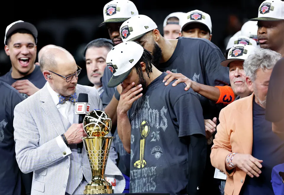 Ernie Johnson, Jr. interviews an emotional New York Knicks guard Jalen Brunson (11) after he received the MVP trophy for his roll in winning the NBA championship. The New York Knicks beat the San Antonio Spurs in game five at Frost Bank Center on Saturday, June13, 2026. The Knicks won the final game 94 to 90.