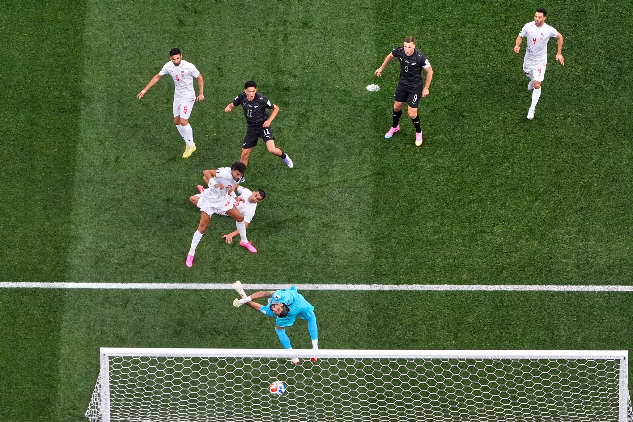One Extraordinary Photo: An overhead look at New Zealand's Elijah Just scoring against Iran By MARK J. TERRILL , Associated Press June 16, 2026