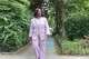 District of Columbia mayoral candidate Janeese Lewis George walks down a street while canvassing in a Washington, neighborhood, Monday, June 15, 2026.