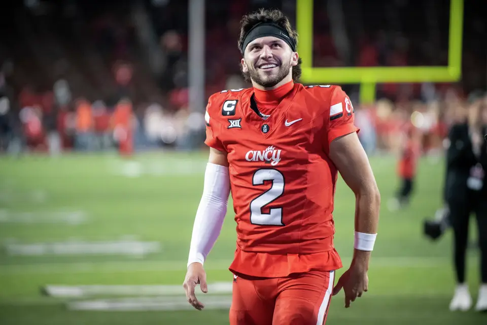 FILE - Cincinnati quarterback Brendan Sorsby (2) walks off the field after a NCAA college football game against Baylor, Oct. 25, 2025, in Cincinnati. (AP Photo/Tanner Pearson, file)
