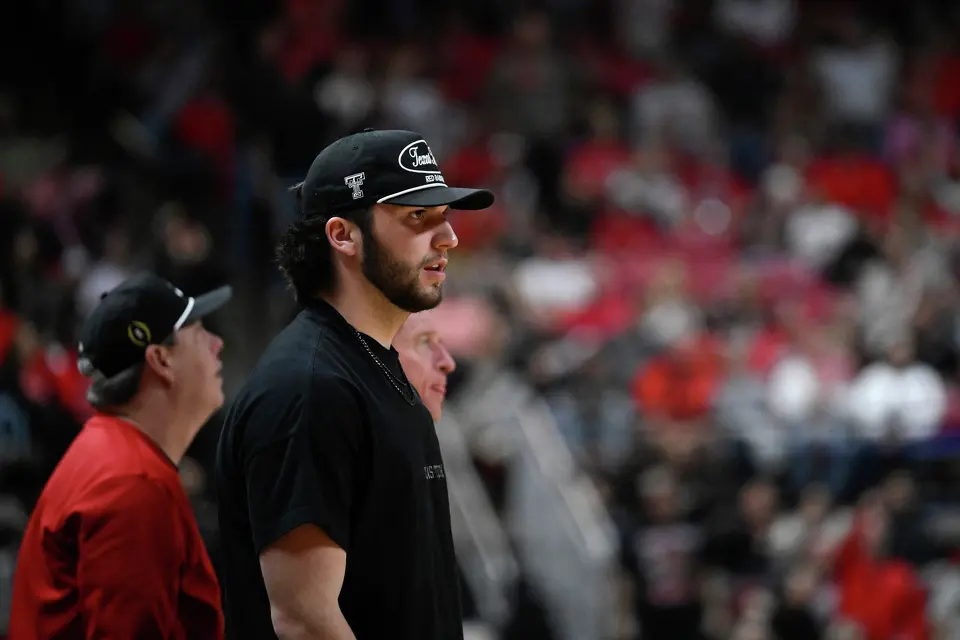Texas Tech quarterback Brendan Sorsby watches from the stands during the second half of an NCAA college basketball game between Texas Tech and Cincinnati Tuesday, Feb. 24, 2026, in Lubbock, Texas. (AP Photo/Justin Rex)
