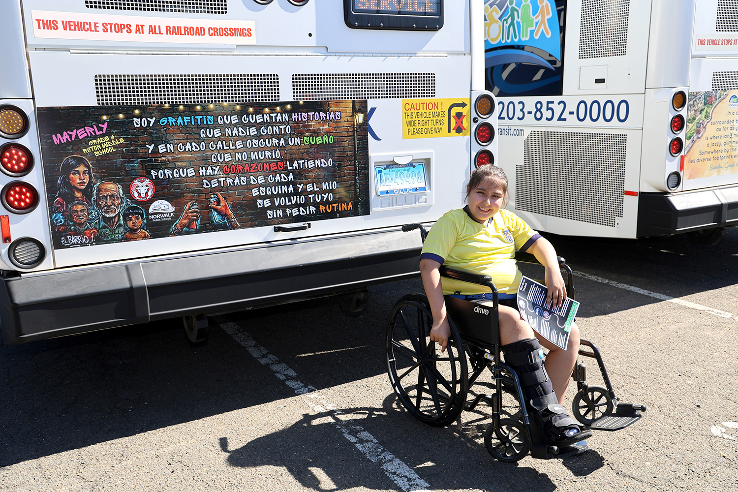 Instead of ads, these Norwalk buses are wrapped in winning poems by middle school students