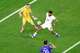 Croatia forward Petar Musa (26) of FC Dallas shoots and scores on England goalkeeper Jordan Pickford (1) during the first half of a FIFA World Cup Group L soccer match at Dallas Stadium in Arlington, June 17, 2026. England defender Reece James (24) was covering on the play.