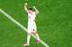England midfielder Elliot Anderson (8) raises his arms as time expires on their 4-2 win over Croatia in a FIFA World Cup Group L soccer match at Dallas Stadium in Arlington, June 17, 2026.