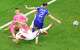 Croatia goalkeeper Dominik Livakovic (1) clears the ball as England forward Harry Kane (9) attempts to score during the second half of a FIFA World Cup Group L soccer match at Dallas Stadium in Arlington, June 17, 2026. Croatia defender Josip Stanišic (2) provided the bloack on the play.