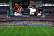 Former Dallas Cowboys players Dez Bryant (left) and Emmitt Smith are shown on the video board during the second half of a FIFA World Cup Group L soccer match between England and Croatia at Dallas Stadium in Arlington, June 17, 2026.