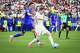 Croatia forward Petar Musa (26) charges England midfielder Elliot Anderson (8) during the second half of FIFA World Cup Group L match, on Wednesday, June 17, 2026 , at Dallas Stadium in Dallas.