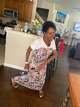 Diane Bailey dances in her kitchen in 2025. Bailey had a stroke in the Dallas County jail Feb. 2, 2026, but her death three weeks later is not being counted by the state.