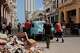 People push a broken-down, classic American car past a pile of trash in Havana, Cuba, Wednesday, June 17, 2026.