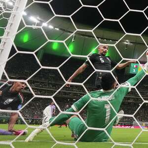 Raúl Rangel uses 'pure reaction' to make save that moves Mexico into knockout stage of World Cup
