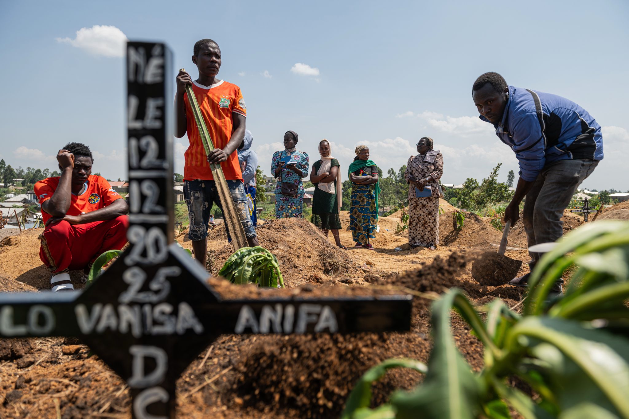 Mourners bury a 6-month-old Ebola victim, marking third orphanage death as Congo outbreak spreads