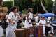 Members of the SHINE Muwasi women's African drum circle perform during a Juneteenth celebration in the Leimert Park neighborhood of Los Angeles, Friday, June 19, 2026.