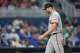 Sam Hentges, l'un des quatre lanceurs des Giants qui ont eu un problème avec le chapeau de fierté de l'équipe, a été critiqué pour ses actions :