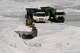 FILE - A front-end loader transports phosphogypsum in Phalaborwa, South Africa, Monday, Sept. 8, 2025.