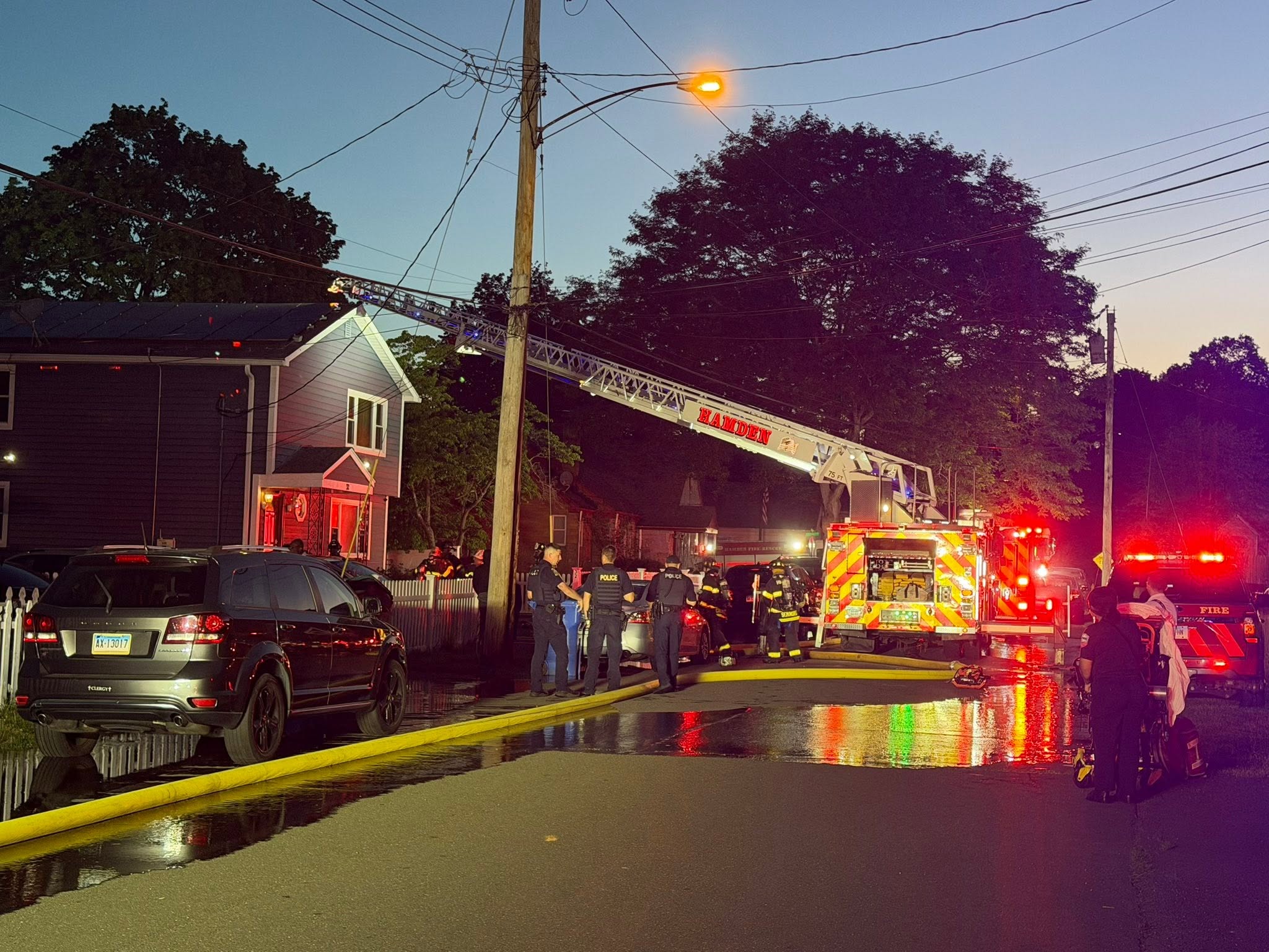 Firefighters rescue dog from burning Hamden home