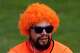 A Dutch fan takes part in the iconic Oranje fan walk for Dutch supporters before the team’s match against Sweden in the FIFA World Cup in Houston, Saturday, June 20, 2026.