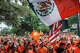 Netherlands fans wave flags and cheer during the Oranje Fanwalk, hosted by Koninklijke Nederlandse Voetbalbond and the Royal Dutch Football Association, in support of the Netherlands as they prepare to face Sweden at Houston Stadium in Houston, June 20, 2026.