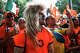 A man sporting a mullet and Netherlands face paint cheers during the Oranje Fanwalk, hosted by Koninklijke Nederlandse Voetbalbond and the Royal Dutch Football Association, in support of the Netherlands as they prepare to face Sweden at Houston Stadium in Houston, June 20, 2026.