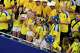 Sweden fans cheer after catching a ball hit into the stands during the FIFA World Cup in Houston, Saturday, June 20, 2026.