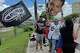 Hundreds of fans waited outside San Antonio International Airport to welcome the San Antonio Spurs home from New York.