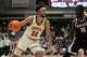Santa Clara forward Allen Graves (22) is defended by Gonzaga's Graham Ike during an NCAA college basketball game in Santa Clara, Calif., Saturday, Feb. 14, 2026. (AP Photo/Jeff Chiu)
